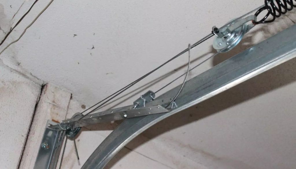 How to Tighten Garage Door Cables Safely